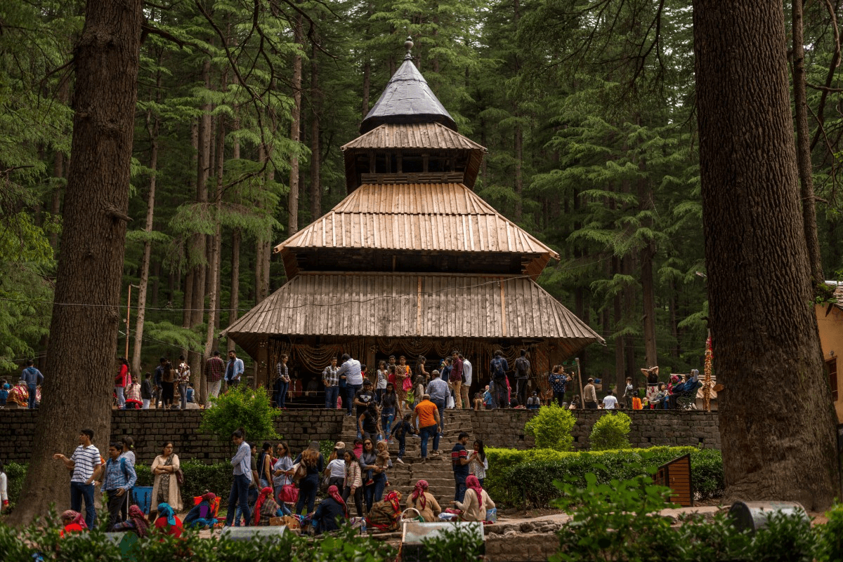 Historic temple surrounded by trees in Manali